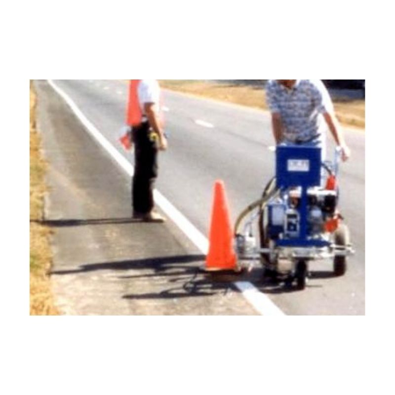 Worker Operating A Road Painting Machine With Traffic Cones