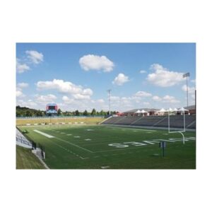 Green Grass Turf Dye Pigment Spray Applied On Football Field At Ounces Per Acre.