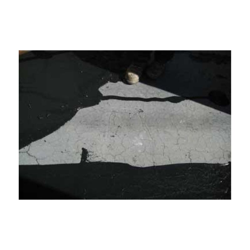 Application Spreading Of Thick Crack Filler Coating.