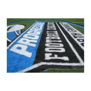 Bright blue colors athletic field paint logo grass painting.