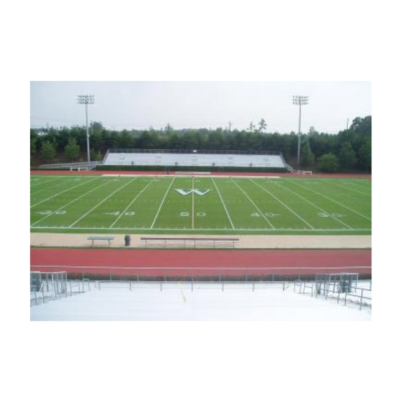 Footaball field paint line striping midield logo painting.