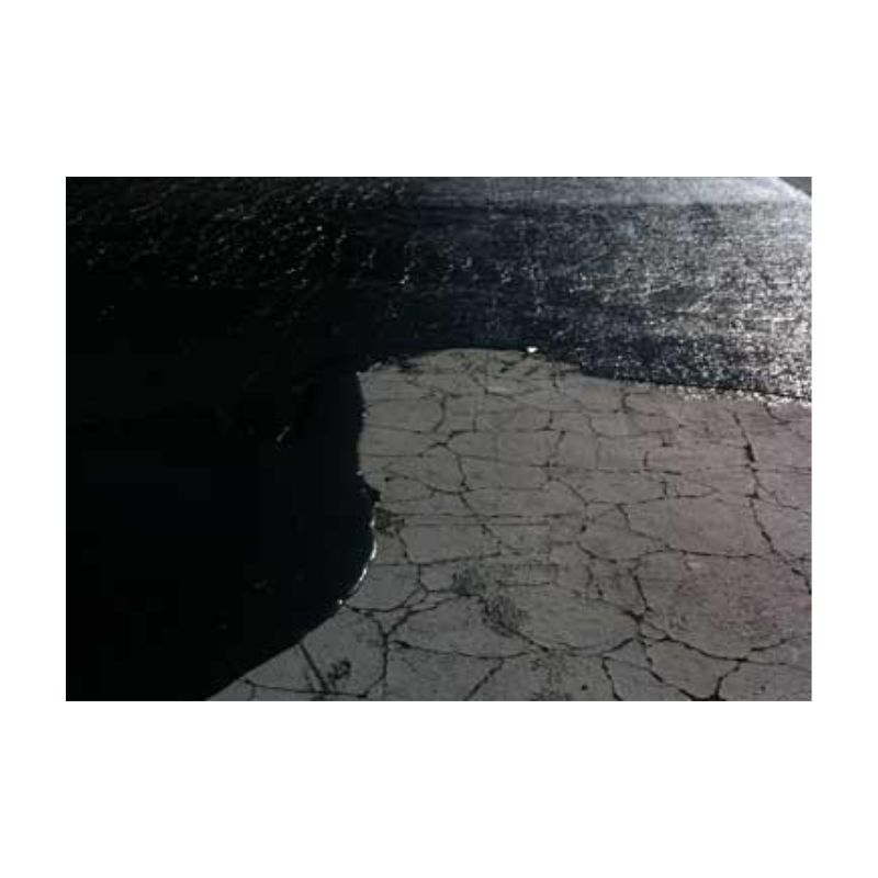 Asphalt Repair Coating For Repairing Wide Cracks.