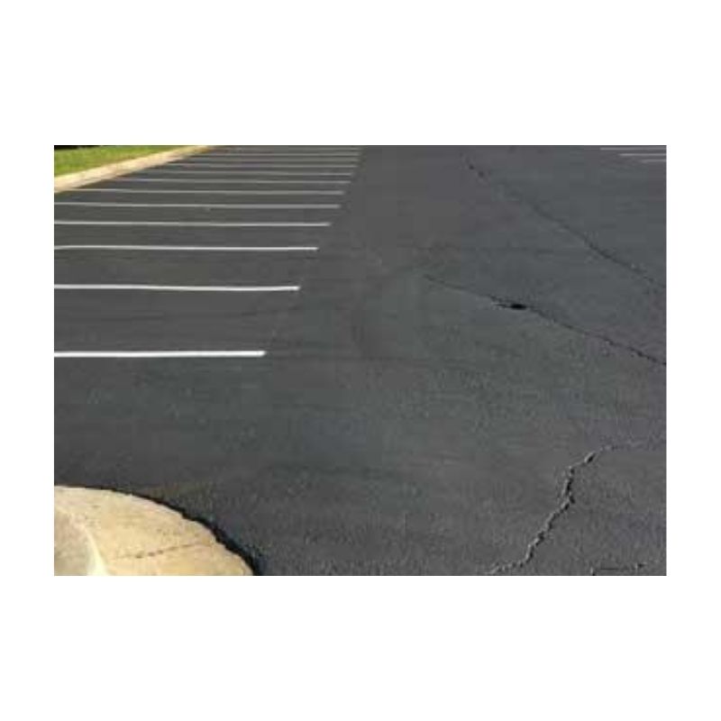 Newly Sealcoated Blacktop Pavement With Clear Lane Divisions