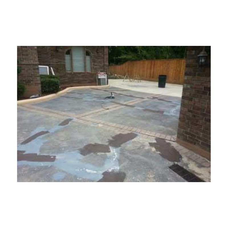 Residential Driveway Patched With Latex Coating Before Painting