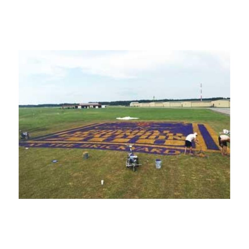 Aerial View Of A Field With People Or Equipment Set Up