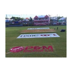 Ofsm Logo Stencil Painted In Red On Sports Field With Grandstand In Background
