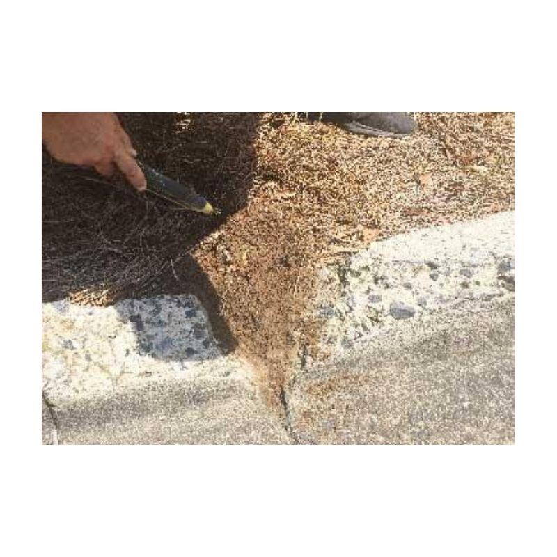 Surface Preparation For Broken Concrete Curb Repair.