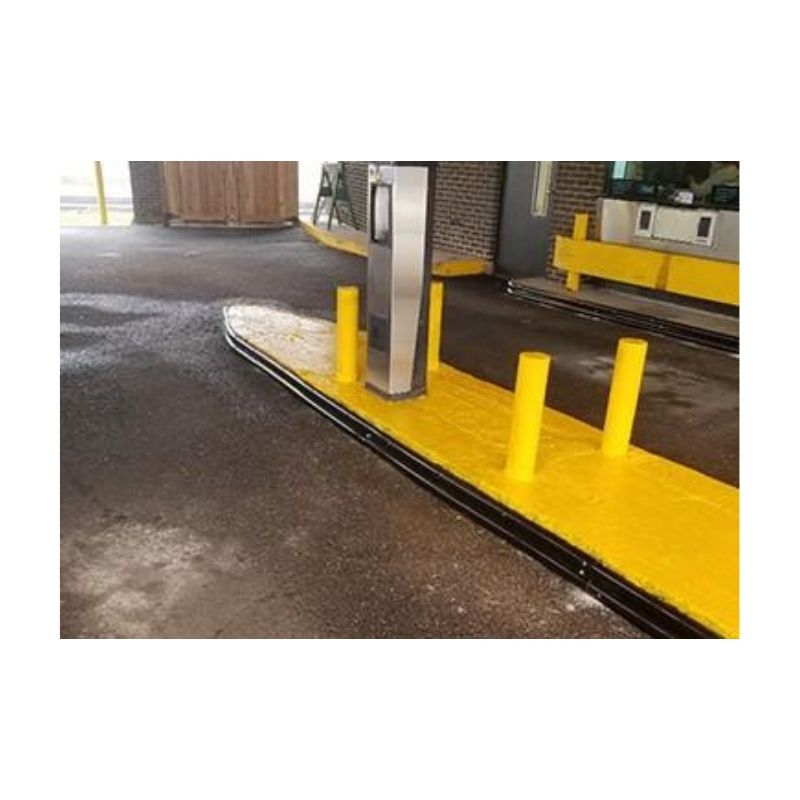 Bank Drive Through Protected With Curb Huggers Yellow Paint.