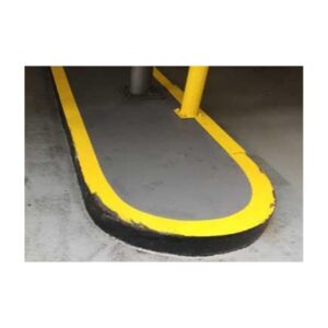 Protective Yellow Corner Guard At Sidewalk Ramp Or Building Entrance