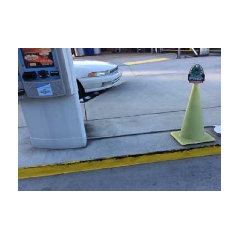 Parking Lot With Traffic Cone And Payment Terminal