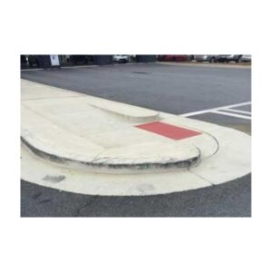 Close-Up Of Concrete Curb With Red-Painted Section