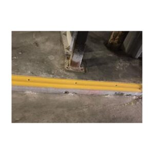 Yellow Safety Line On Concrete Warehouse Floor