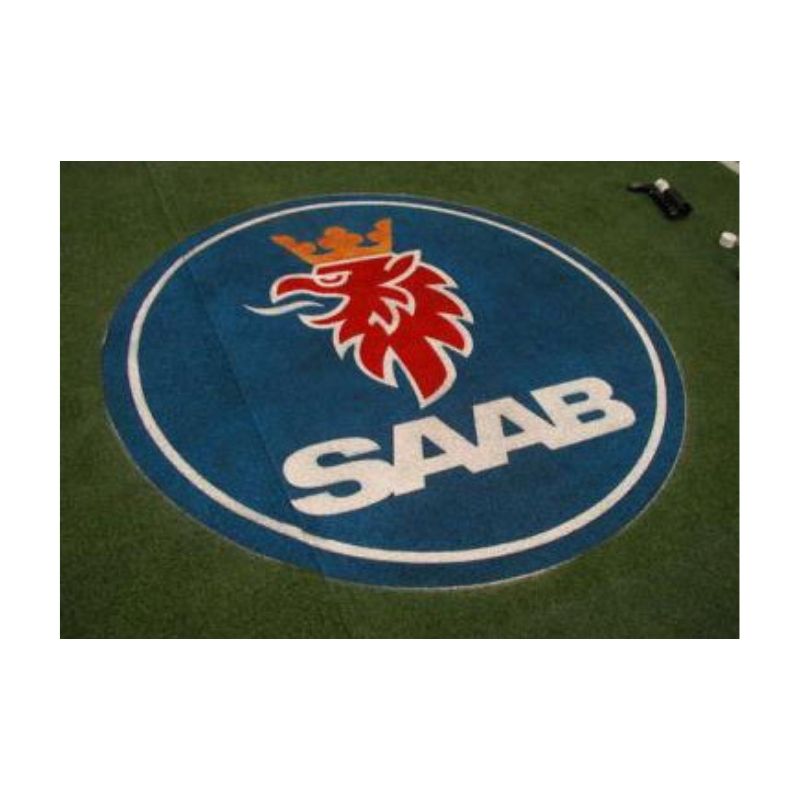 Logo stencil permanent paint synthetic field turf grass.