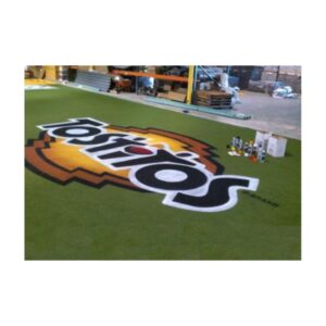 Permanent paint synthetic turf field lines logos.
