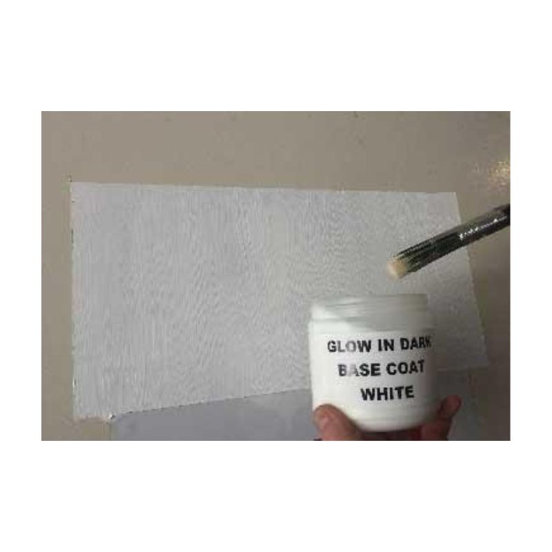 Brush Applying Phosphorescent Glow Pigment On White Surface
