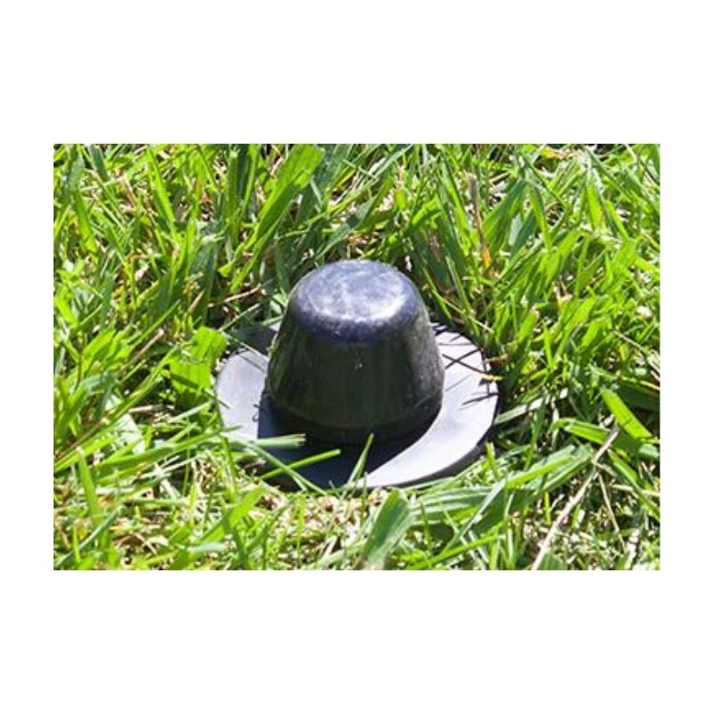 Ground Marker Plastic Socket Pushed Down Flush To The Ground.