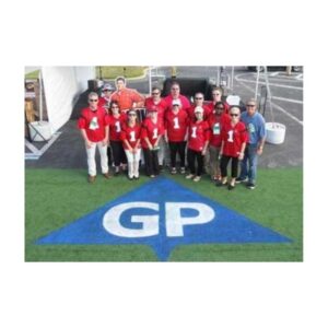 Team Photo On Painted Field Logo With Gp Letters