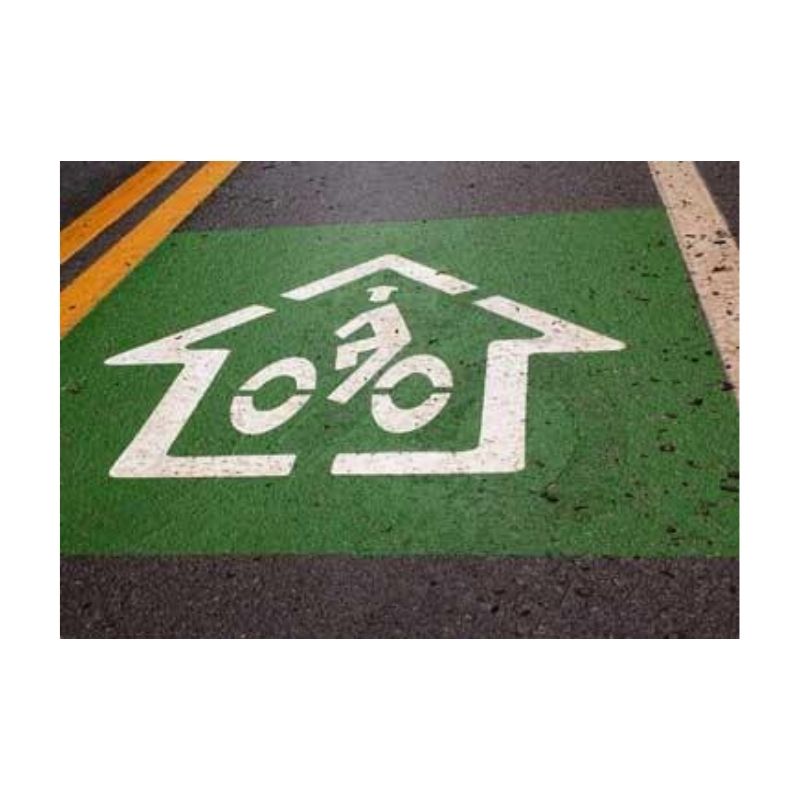 Green Bicycle Lane Symbol With An Arrow On Pavement