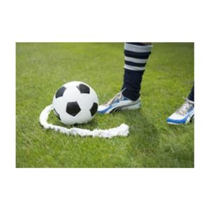 Soccer free kick vanishing foam aerosol can spray line referee marking.