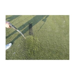 Shadow Of A Person And Object On A Grassy Field