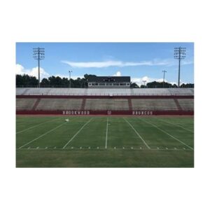 Paint football field lines logo numbers hashmarks with special paint made for athletic field marking robots painting