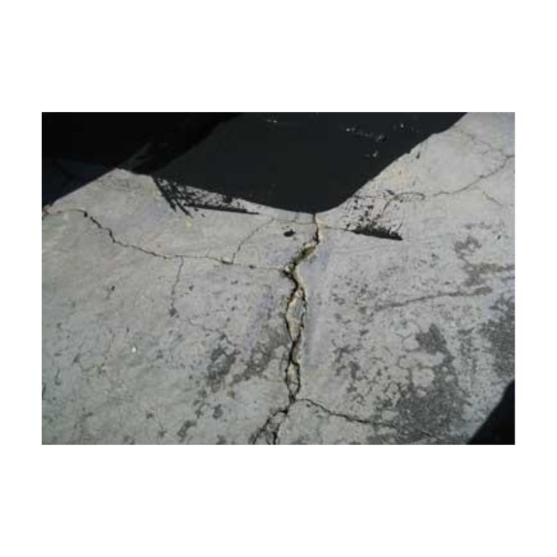 Squeegee Repair Of Wide Deep Cracks Asphalt Driveway.
