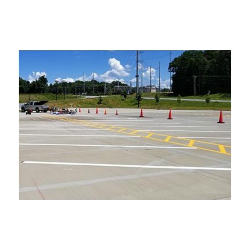 Parking Lot With Traffic Cones Set Up For Lane Markings