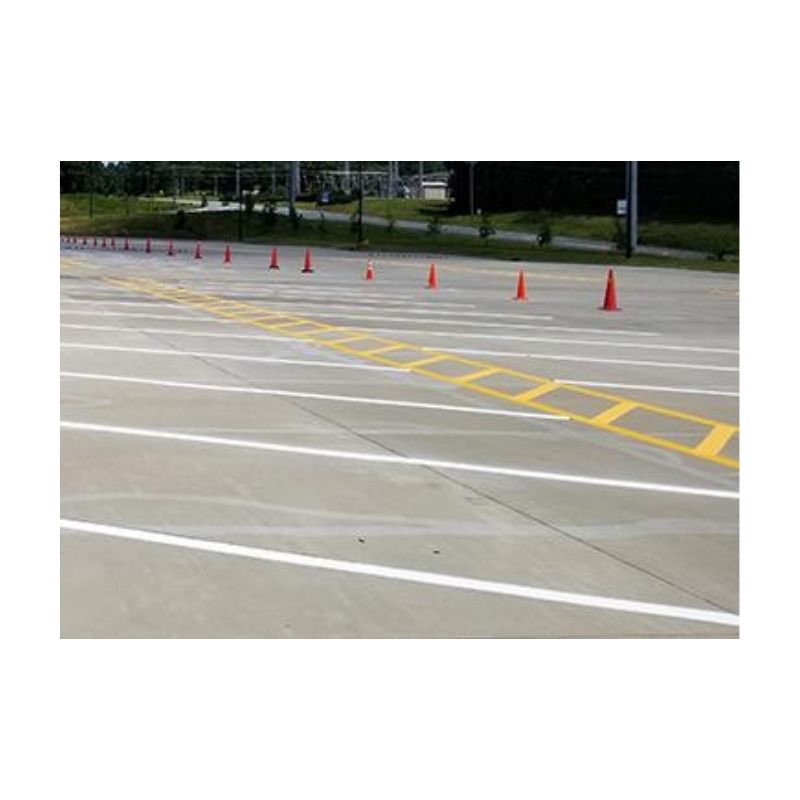 Concrete Lot With Multiple Crisp White And Yellow Striping Lines