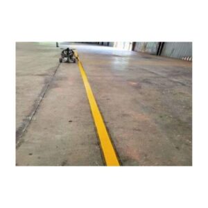 Freshly Painted Yellow Warehouse Floor Line
