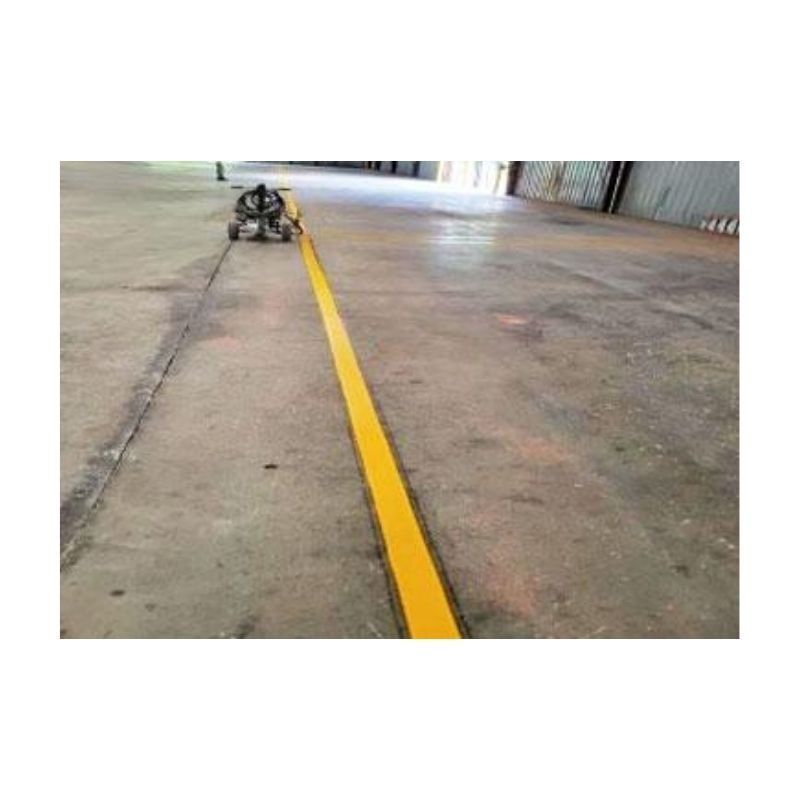 Freshly Painted Yellow Warehouse Floor Line