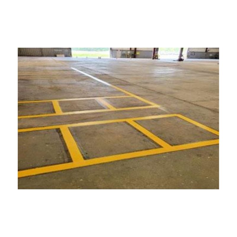 Warehouse Floor With Bold Yellow Safety Lines Marking Zones