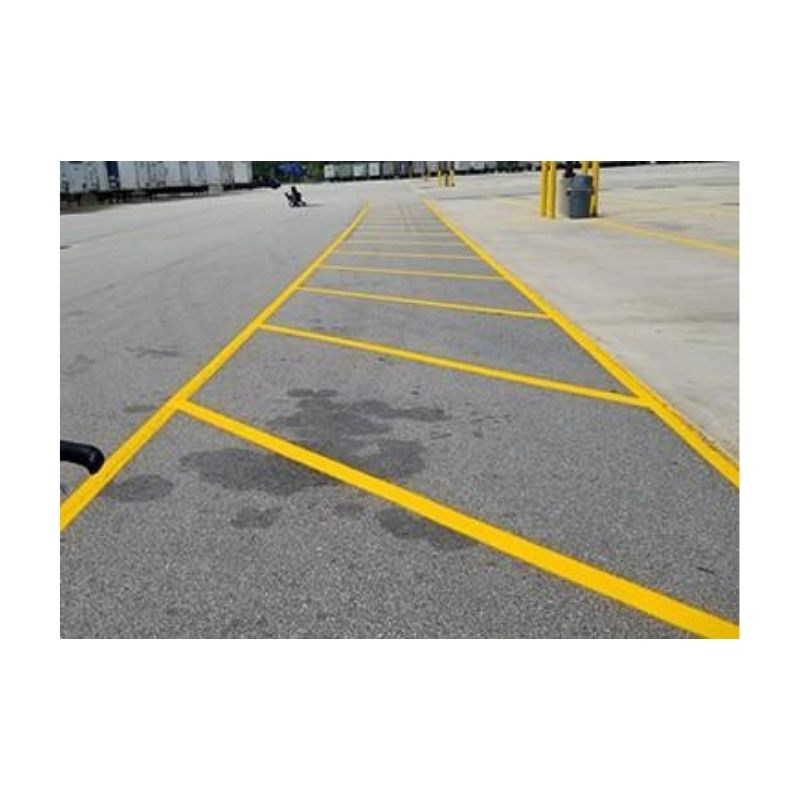 Yellow Diagonal Lines Marking No-Parking Zone In Lot