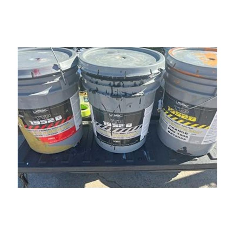 Buckets Of Aquastripe Field Marking Paint With Color-Coded Lids